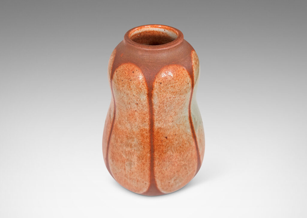 Gallery BAC double gourd form, glazed in matte russet brown, with ovoid shades in shiny tan with brown stippling