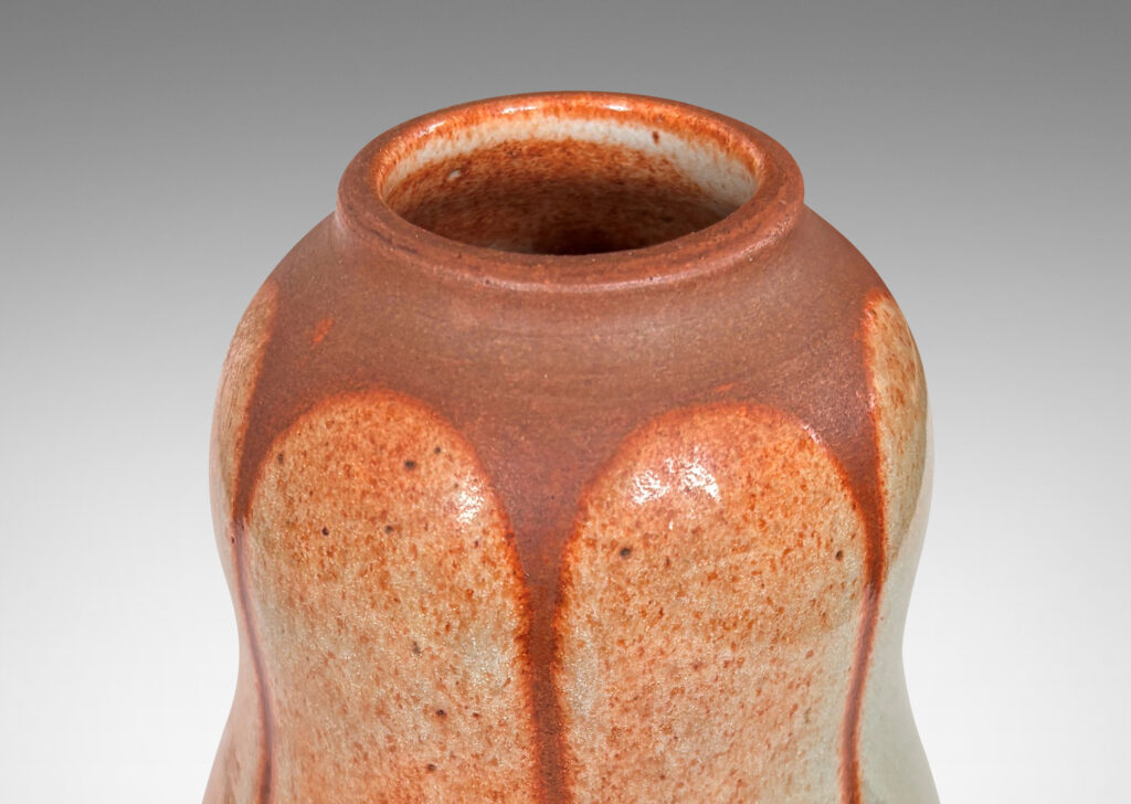 Gallery BAC double gourd form, glazed in matte russet brown, with ovoid shades in shiny tan with brown stippling