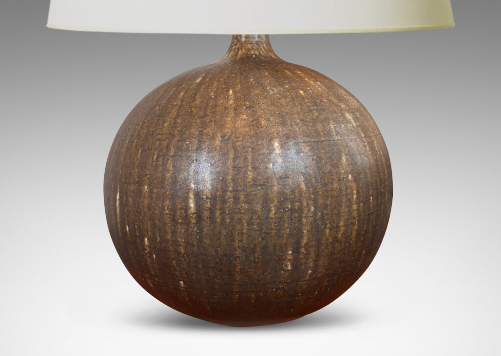 Gallery BAC globe form with slender spouting neck, glazed in flowing dark green