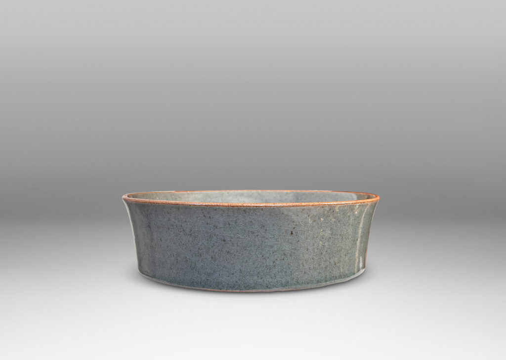 Gallery BAC flat circular bottom with coved sides, glazed in gray-blue