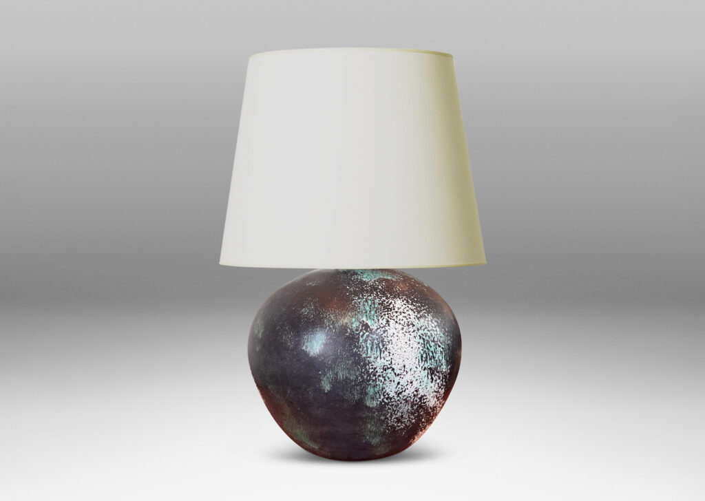 Gallery BAC plump globe form, glazed in a matte black with airy blushes of white and blue-green