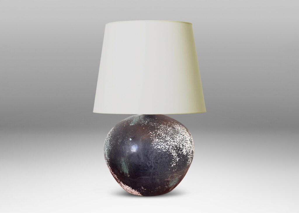 Gallery BAC plump globe form, glazed in a matte black with airy blushes of white and blue-green