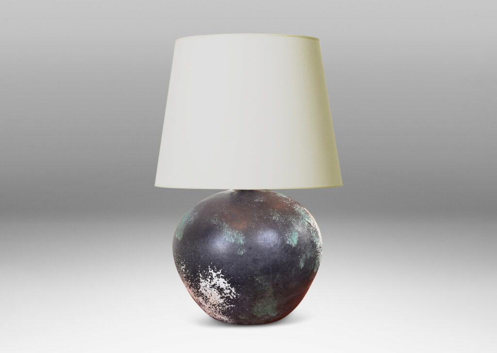 Gallery BAC plump globe form, glazed in a matte black with airy blushes of white and blue-green