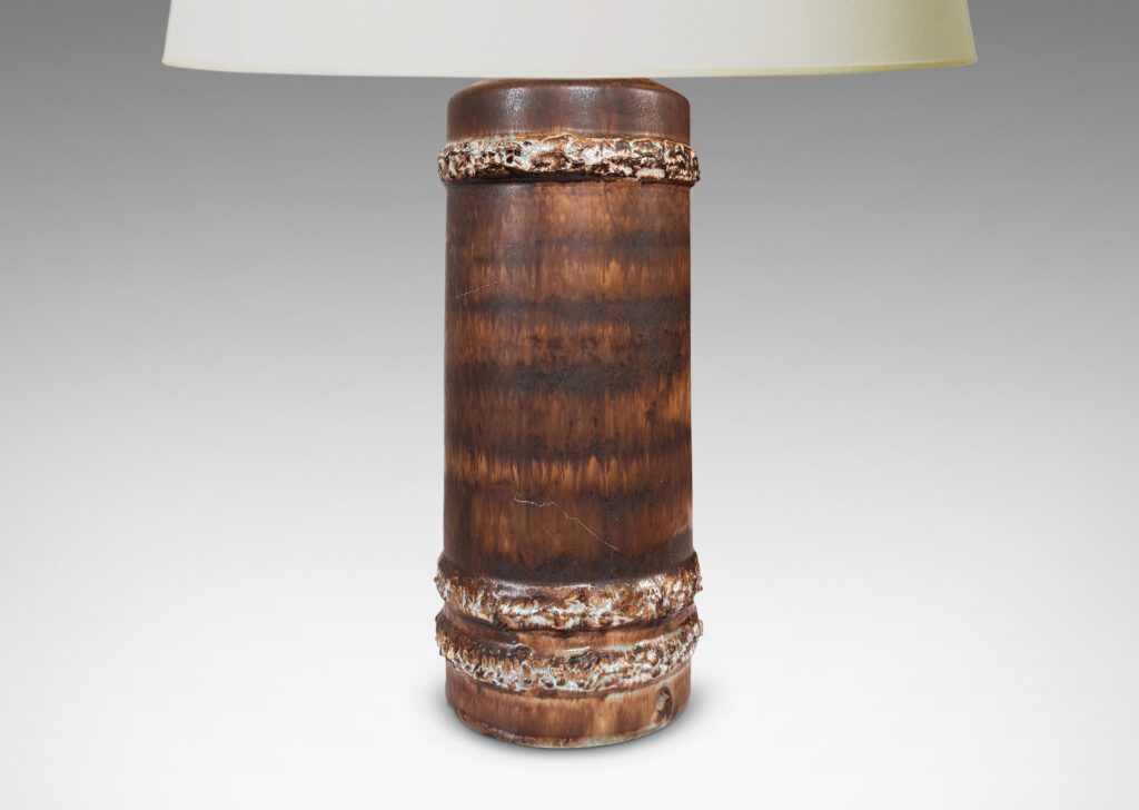 Gallery BAC cylindrical form with raised highly textured bands, glazed in matte flowing dark brown