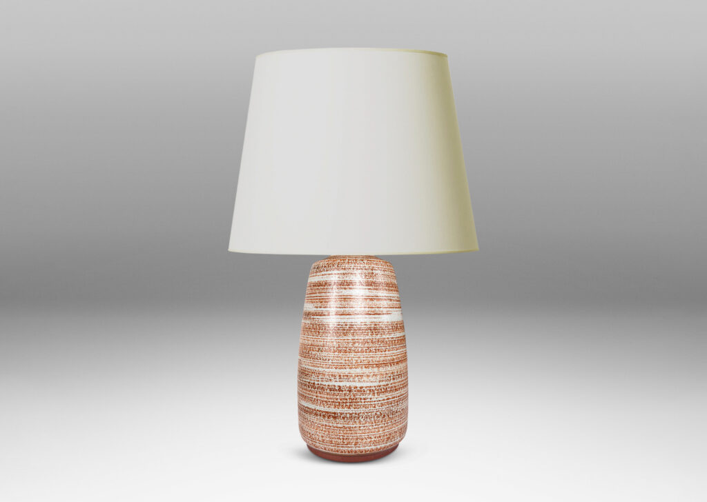 Gallery BAC organically modeled cylindrical form glazed in a warm brown striae over pale gray