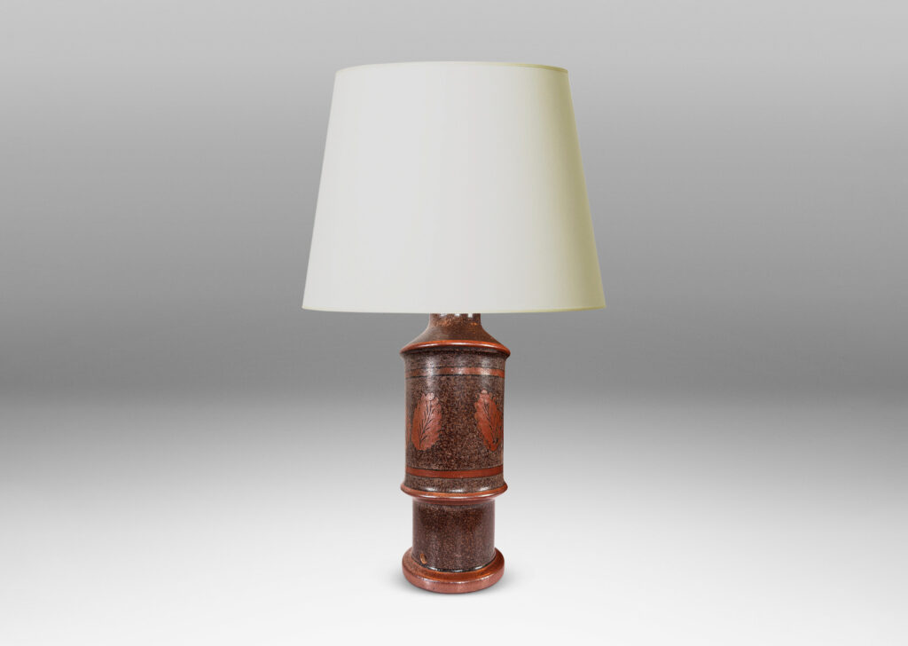Gallery BAC tiered cylindrical form with notched accents, glazed in sponged dark over medium brown