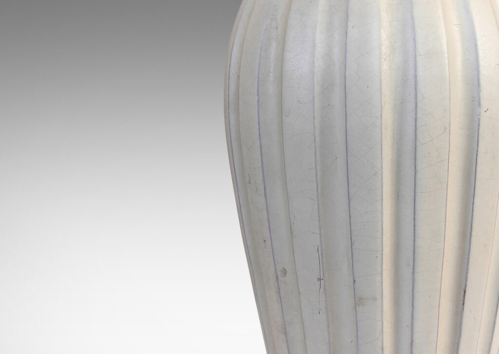 Gallery BAC vertically fluted bulbous form in an eggshell finish ivory glaze