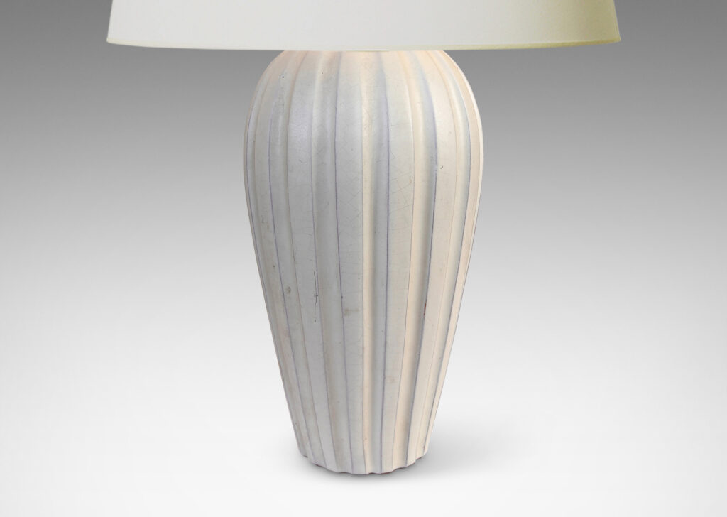 Gallery BAC vertically fluted bulbous form in an eggshell finish ivory glaze