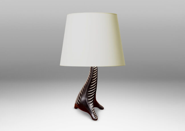 Gallery BAC whimsical animal-like form in black with carved stripes in white