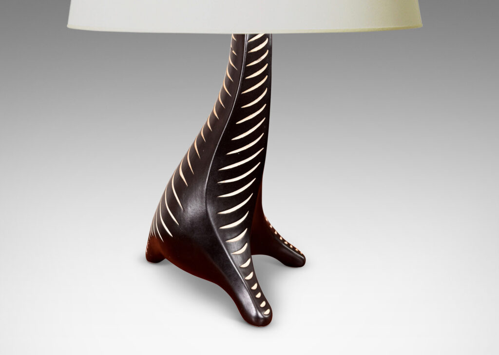 Gallery BAC whimsical animal-like form in black with carved stripes in white