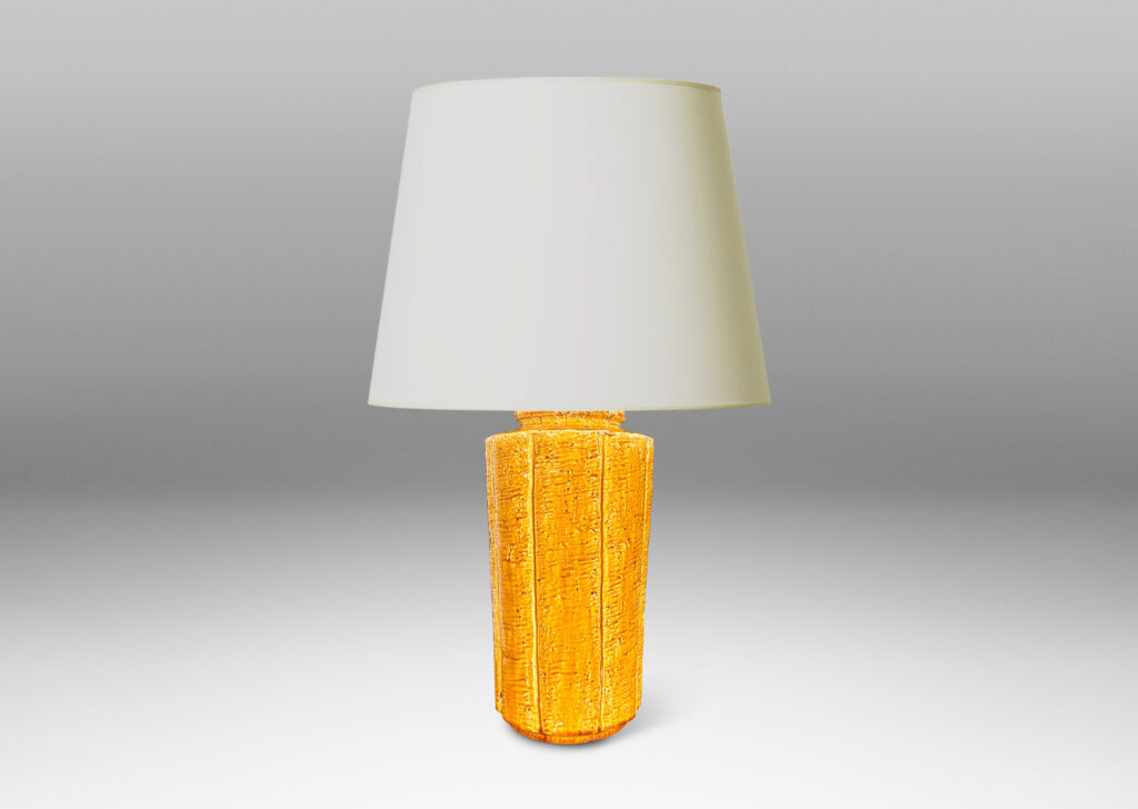 Gallery BAC lobed and tapered cylindrical form with grog texture, glazed in a saturated earthy yellow