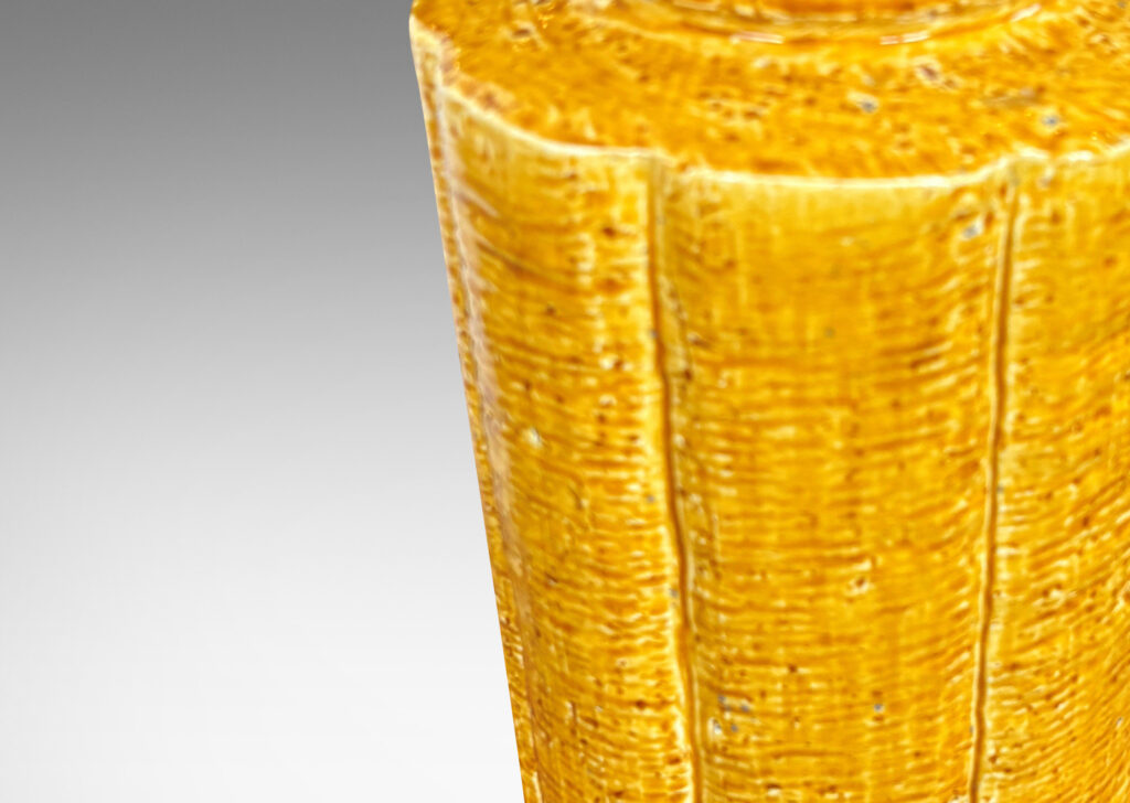 Gallery BAC lobed and tapered cylindrical form with grog texture, glazed in a saturated earthy yellow