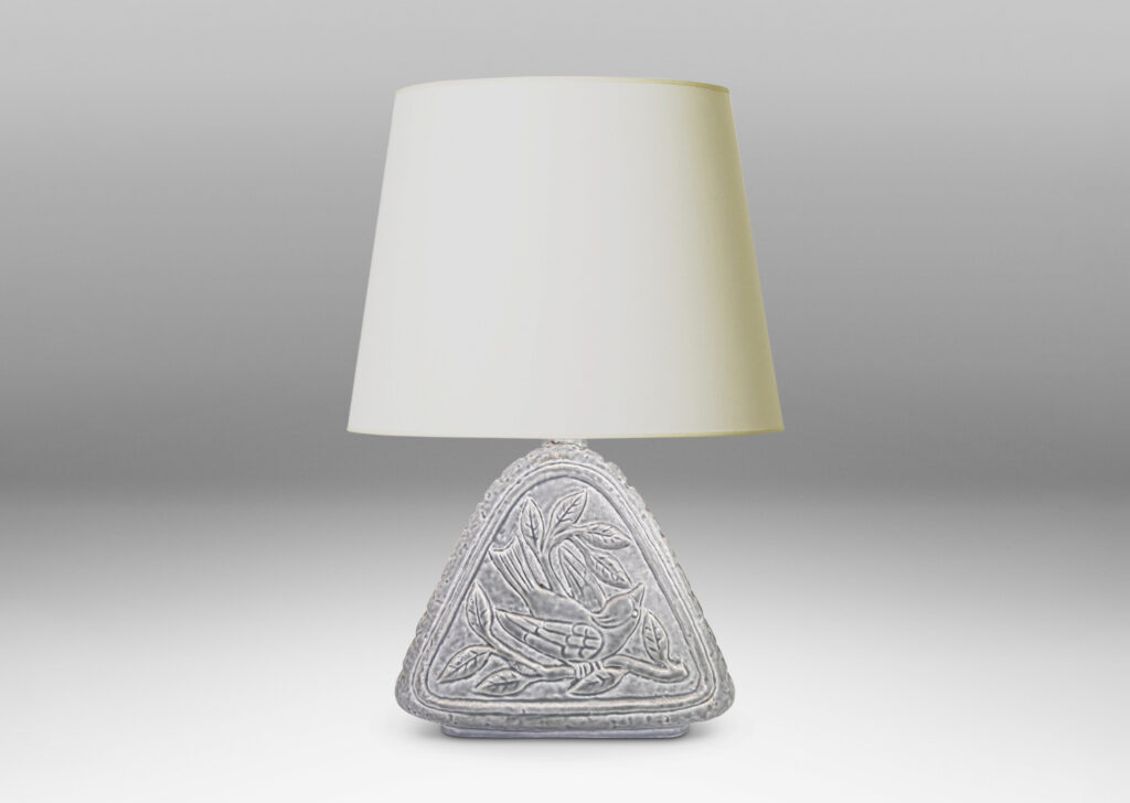 Gallery BAC riangular form with reliefs depicting birds on each side and ridged sides