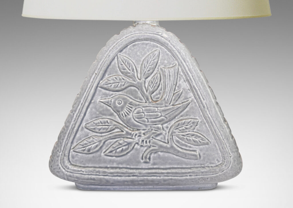 Gallery BAC riangular form with reliefs depicting birds on each side and ridged sides