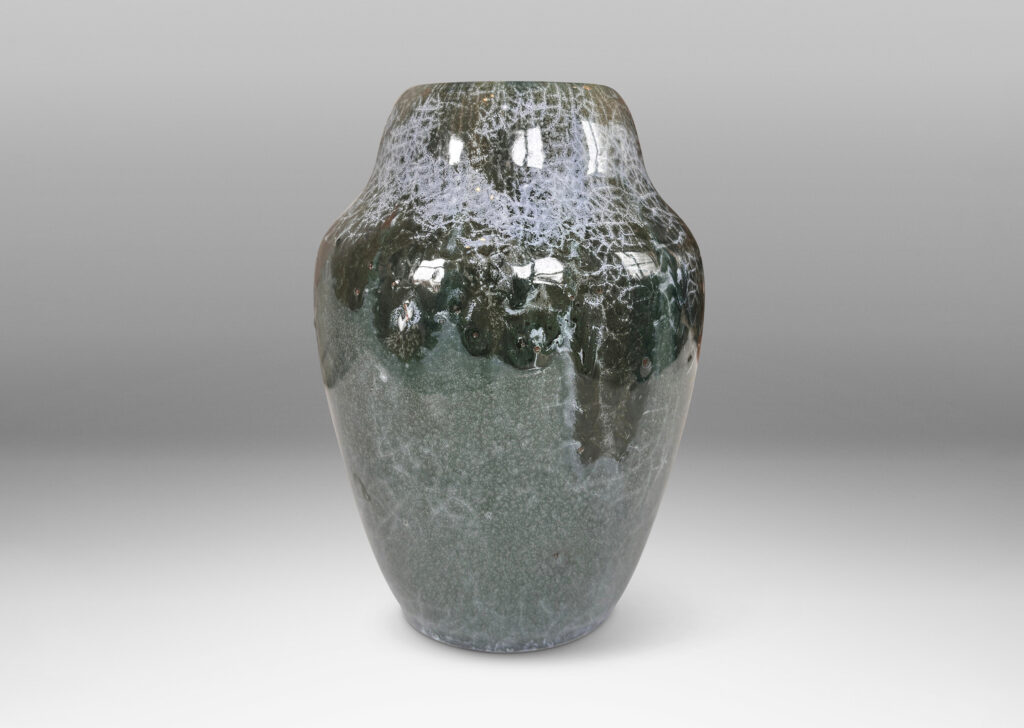 Gallery BAC ginger jar style form, glazed in a shiny jade green, with flowing dark jungle green and pale gray-blue craquel patterning