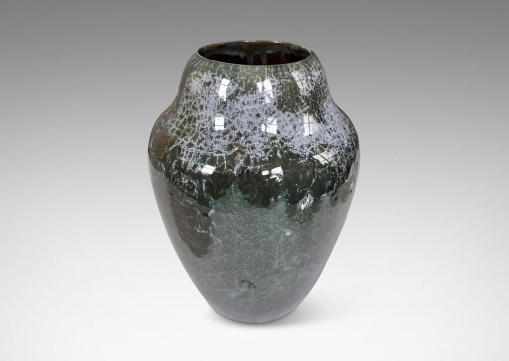 Gallery BAC ginger jar style form, glazed in a shiny jade green, with flowing dark jungle green and pale gray-blue craquel patterning