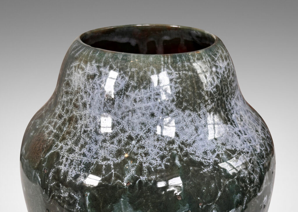 Gallery BAC ginger jar style form, glazed in a shiny jade green, with flowing dark jungle green and pale gray-blue craquel patterning