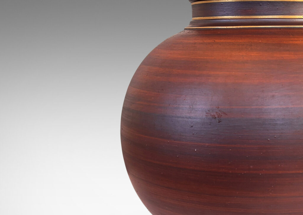 Gallery BAC globe forms with reveal and collar neck, glazed in a wonderful faux-bois striae brown with gilded accents
