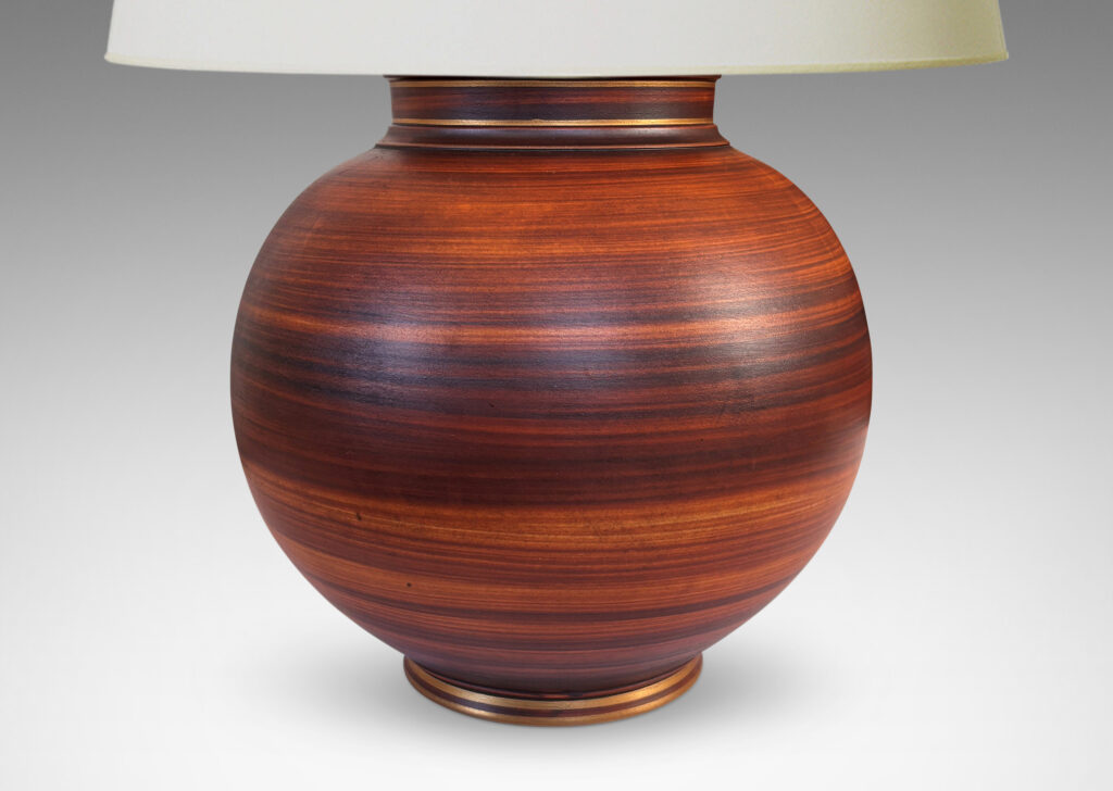 Gallery BAC globe forms with reveal and collar neck, glazed in a wonderful faux-bois striae brown with gilded accents
