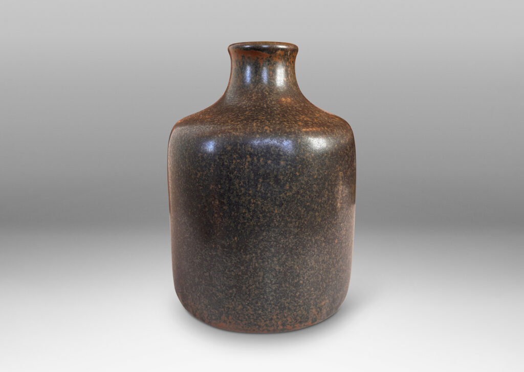 Gallery BAC organically modeled squared form with spout neck, glazed in a sponged green-brown, brown, and black