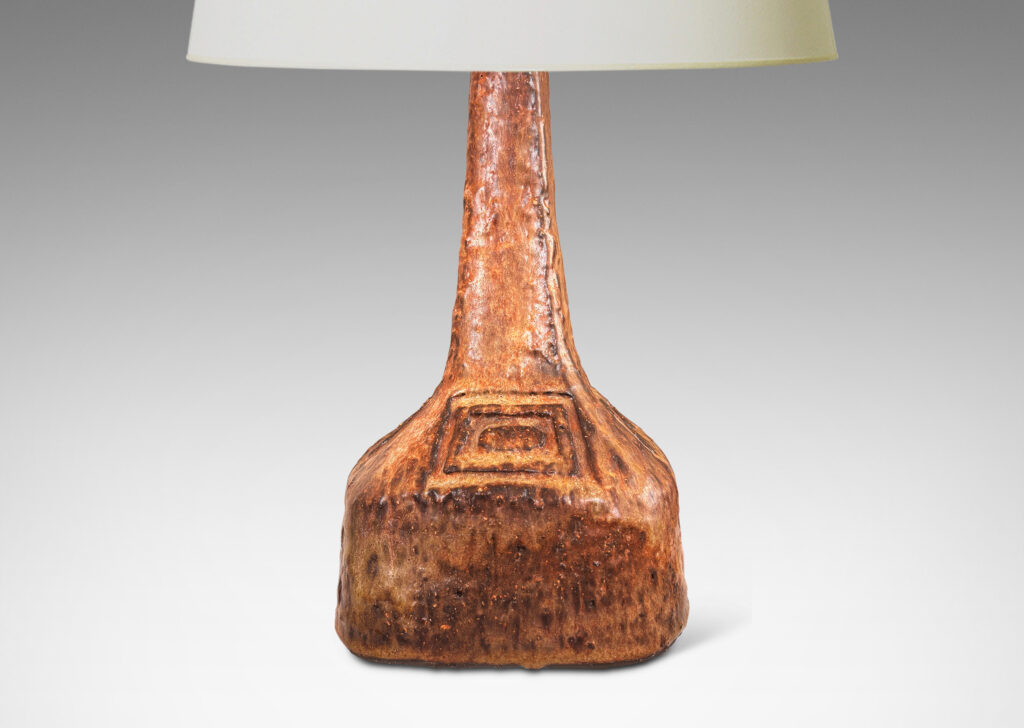 Gallery BAC low square form with attenuated neck and carved concentric rectangular motifs