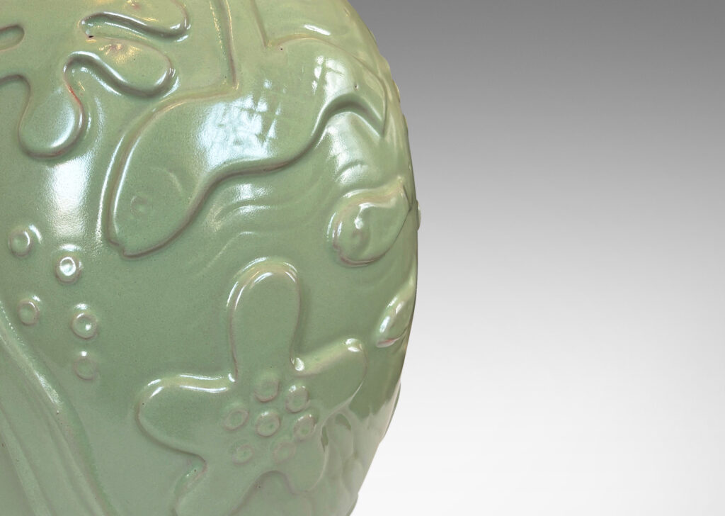 Gallery BAC large ovoid form surrounded in exuberant reliefs of marine life, glazed in a bright celadon green