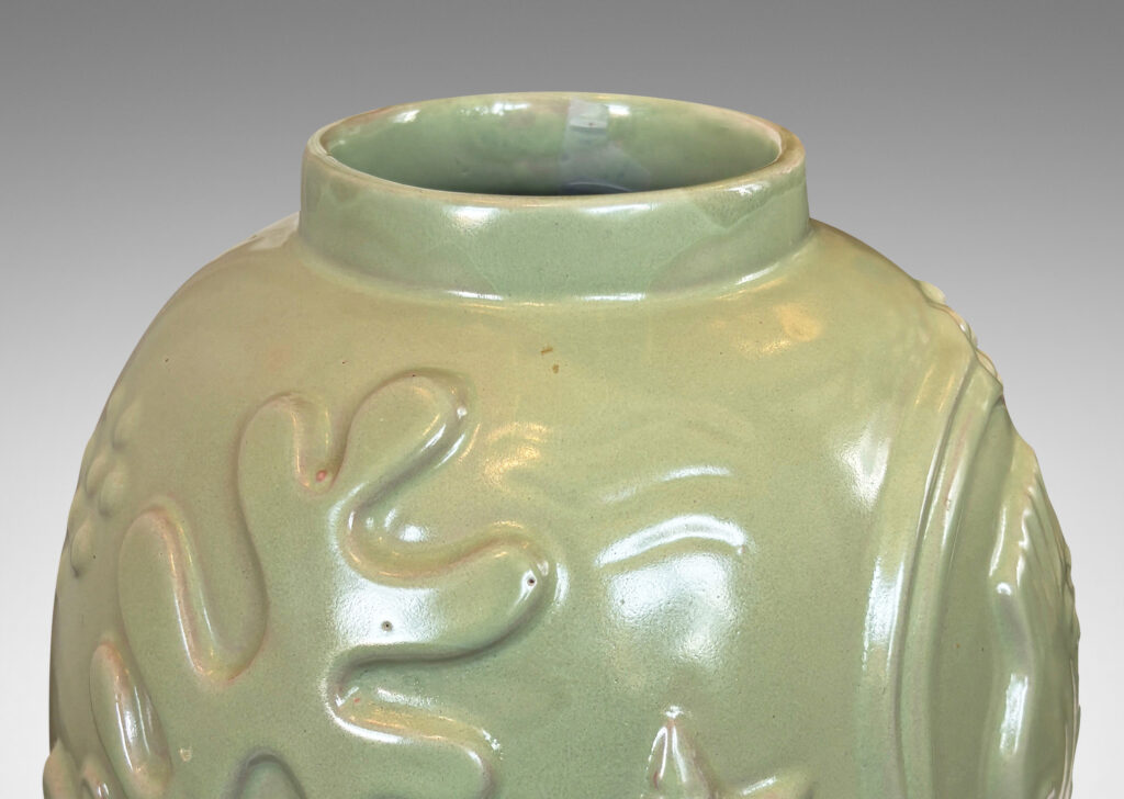 Gallery BAC large ovoid form surrounded in exuberant reliefs of marine life, glazed in a bright celadon green