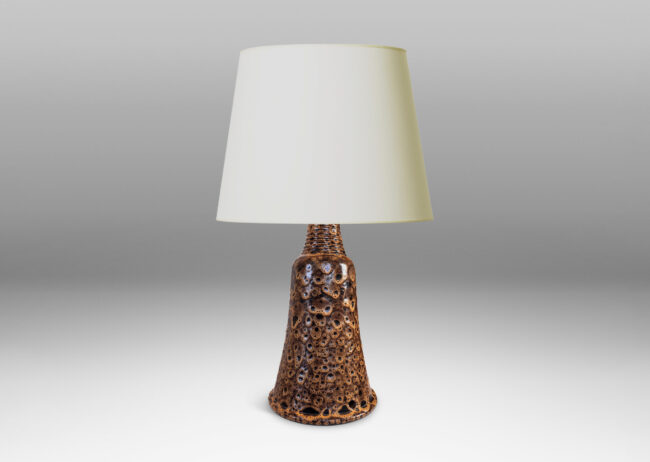 Gallery BAC bell form with ridged neck, glazed in a dark brown with frothy tan “lava” texture