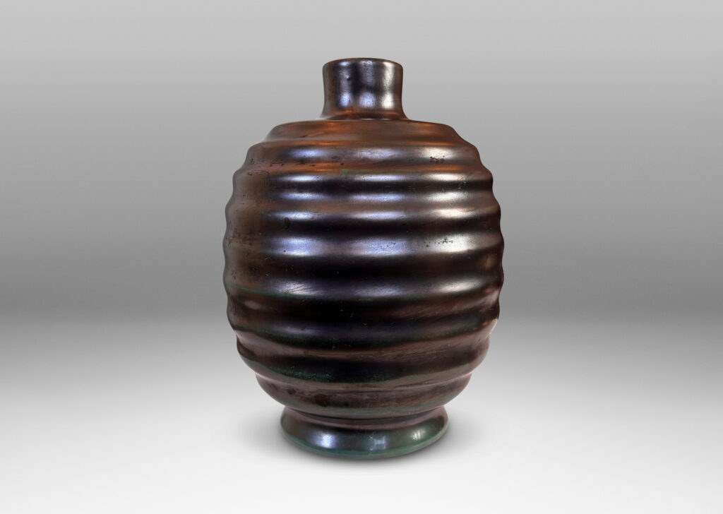 Gallery BAC ovoid form with sculptural horizontal ridging, glazed in a lustrous tonal teal-gunmetal