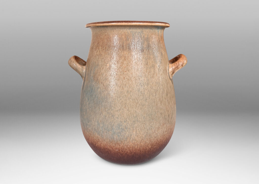 Gallery BAC ovoid form with wide flared mouth and loop handles, glazed in bluish gray and brown harefur glazes