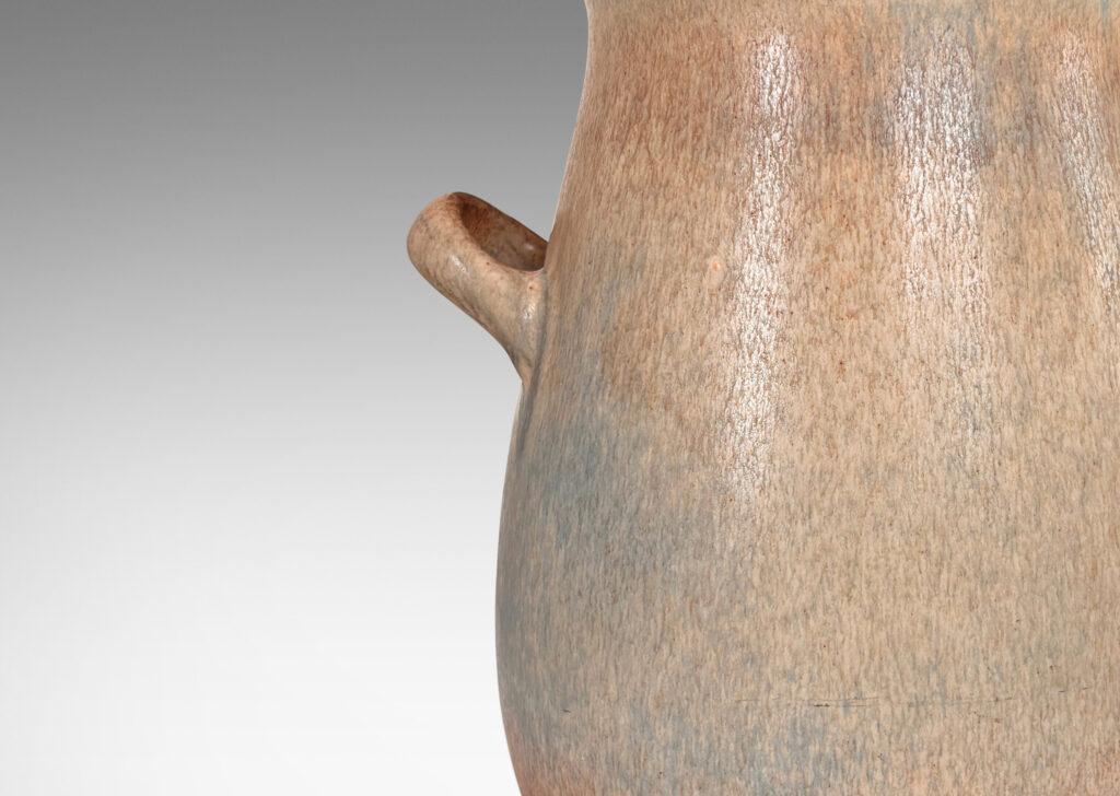 Gallery BAC ovoid form with wide flared mouth and loop handles, glazed in bluish gray and brown harefur glazes