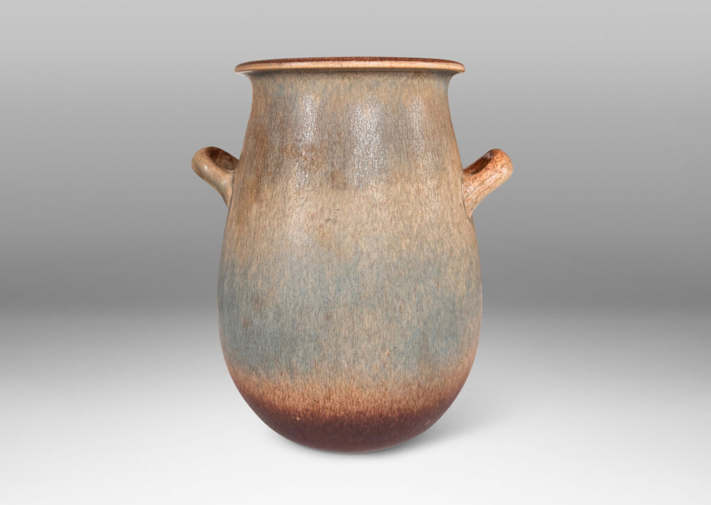 Gallery BAC ovoid form with wide flared mouth and loop handles, glazed in bluish gray and brown harefur glazes