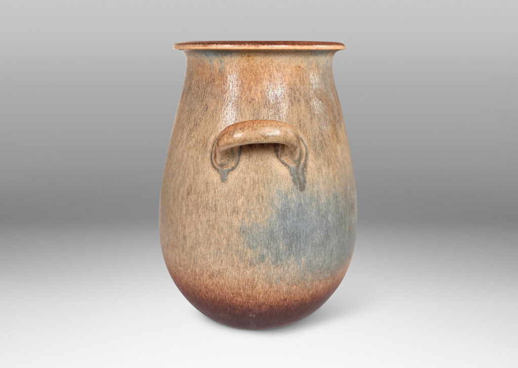 Gallery BAC ovoid form with wide flared mouth and loop handles, glazed in bluish gray and brown harefur glazes
