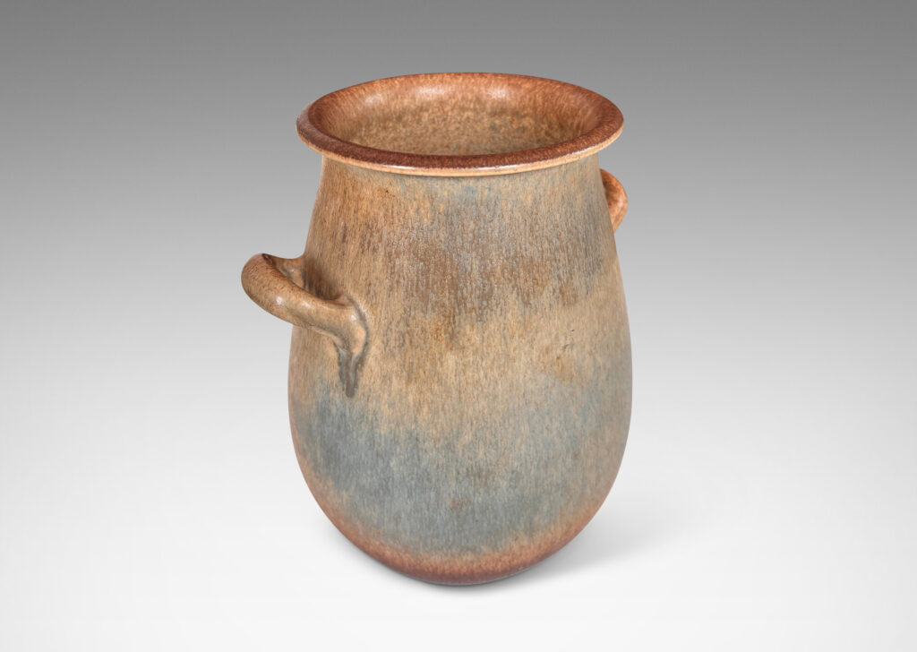 Gallery BAC ovoid form with wide flared mouth and loop handles, glazed in bluish gray and brown harefur glazes