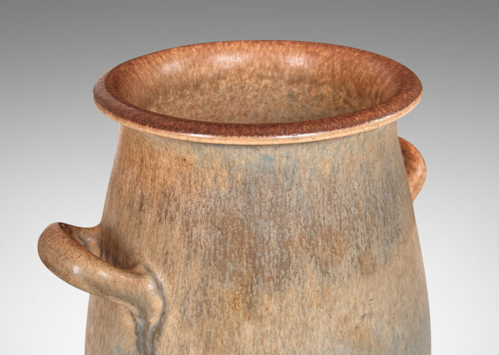 Gallery BAC ovoid form with wide flared mouth and loop handles, glazed in bluish gray and brown harefur glazes
