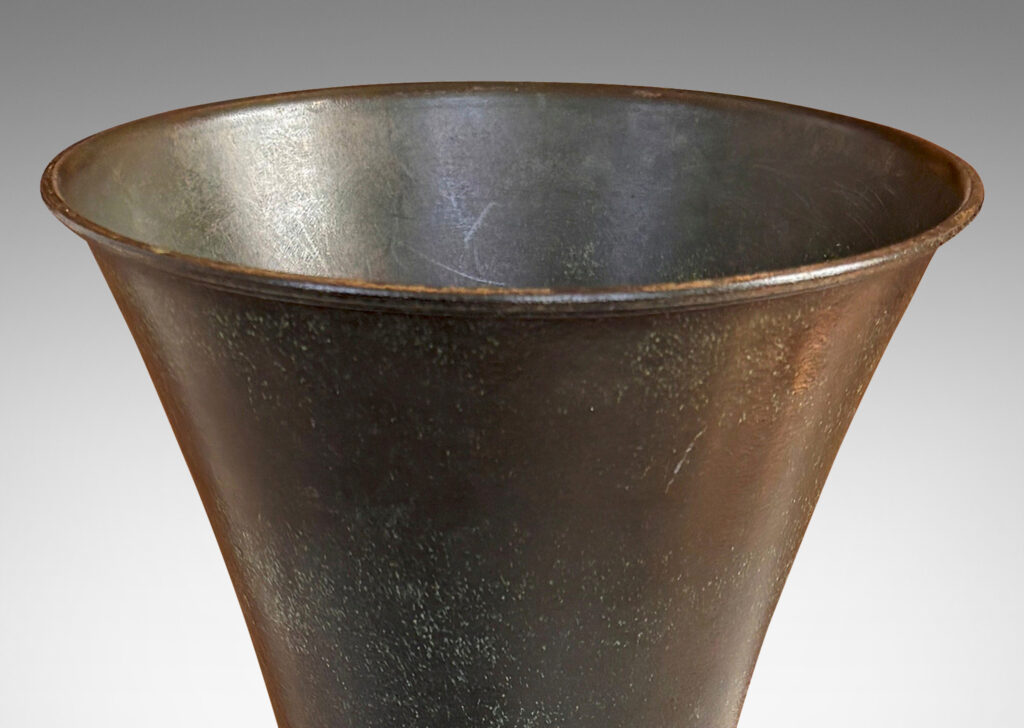 Gallery BAC flared trumpet form on a bell-shaped stand, with applied stylized acanthus leaf ornaments and a handsome original patination with green and brown tones