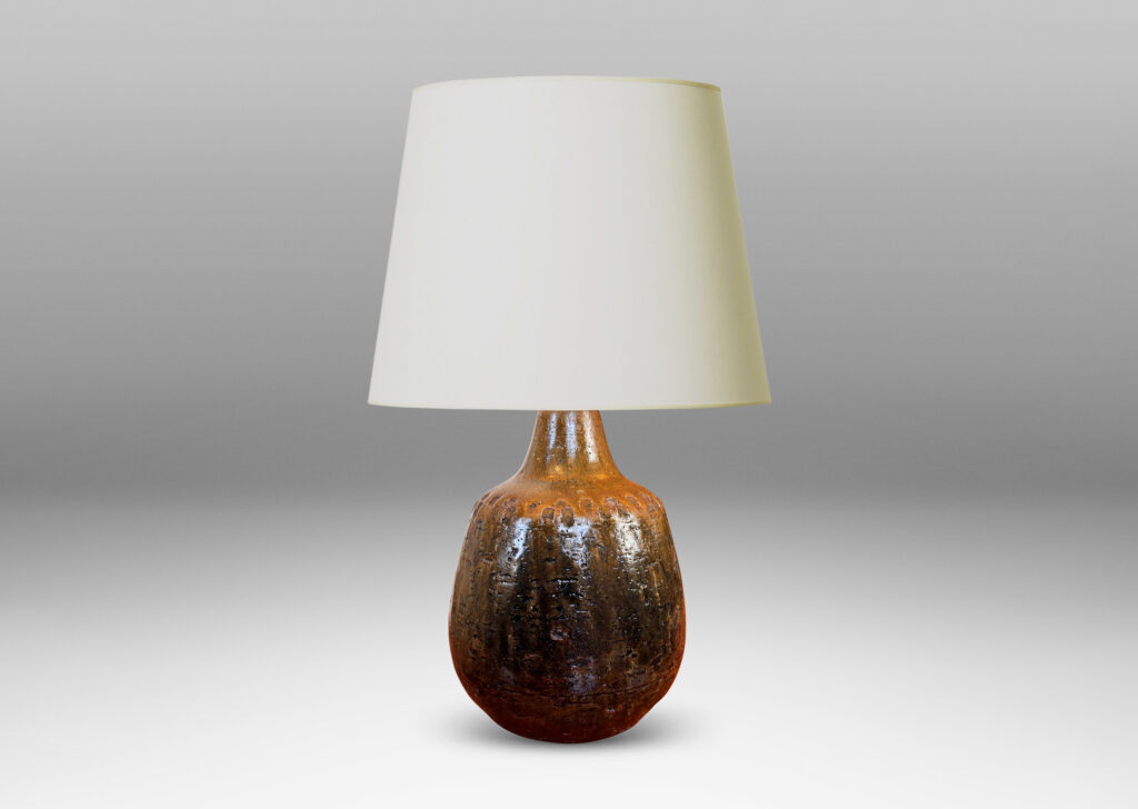 Gallery BAC plump ovoid form with grog texture and geometric motifs impressed around shoulder, glazed in olive brown