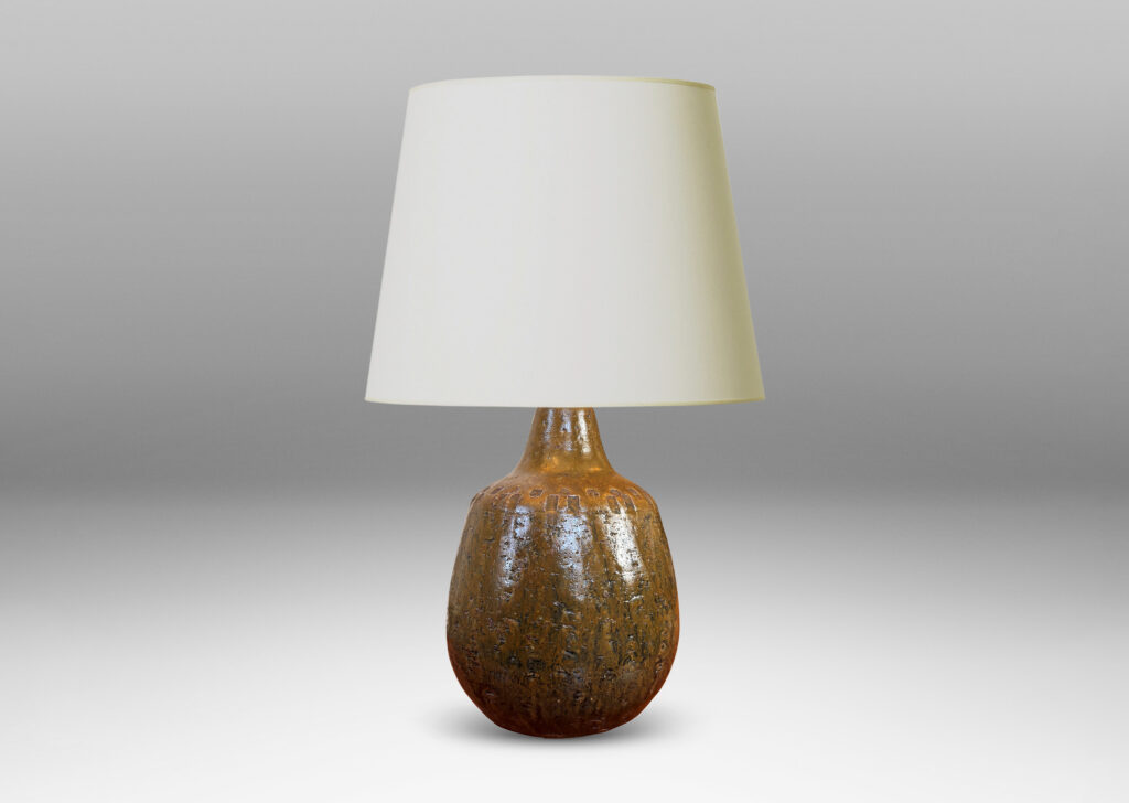 Gallery BAC plump ovoid form with grog texture and geometric motifs impressed around shoulder, glazed in olive brown