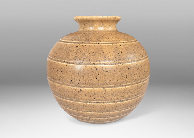 Gallery BAC globe form with carved banding, finished in a satin-finish flecked beige glaze