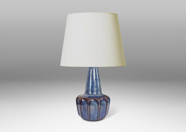 Gallery BAC pawn-like form with a fluted drum body and conical neck, glazed in a gloss blue luster