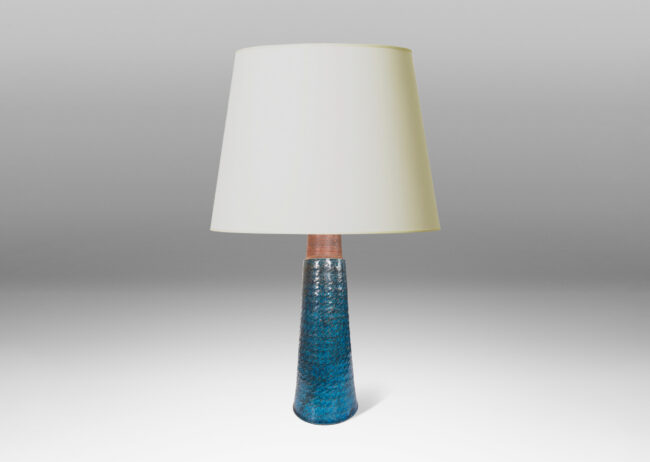 Gallery BAC tall conical form ornamented with carved diagonal hatches, glazed in a shiny mottled azure blue
