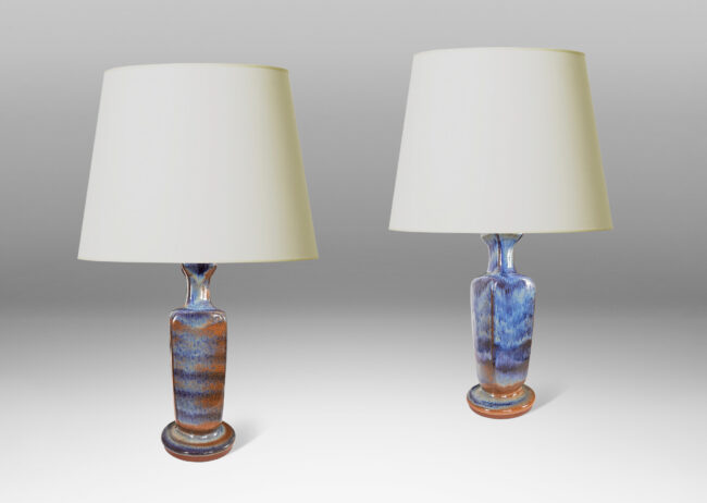 Gallery BAC squared baluster forms on disk plinths, glazed in flowing blue luster and brown