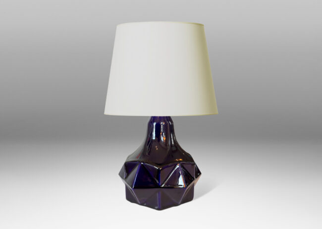 Gallery BAC low drum form with projecting faceted diamond reliefs and a sprouting neck, glazed in a shiny deep purple