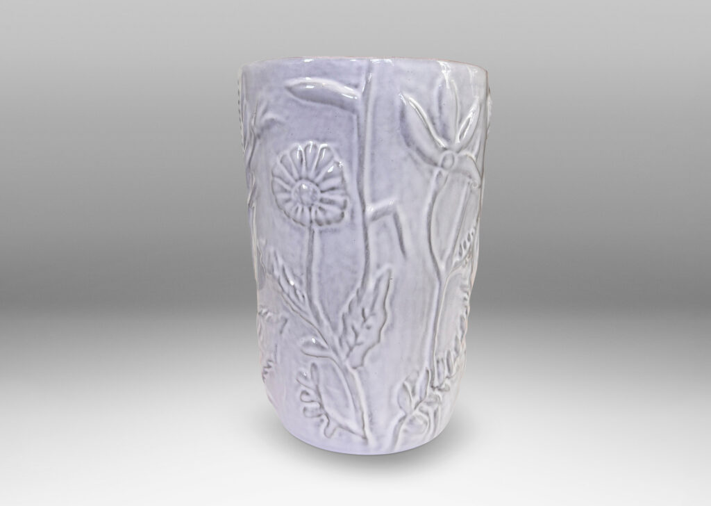 Gallery BAC apered cylindrical form with cast wildflower design in white glaze