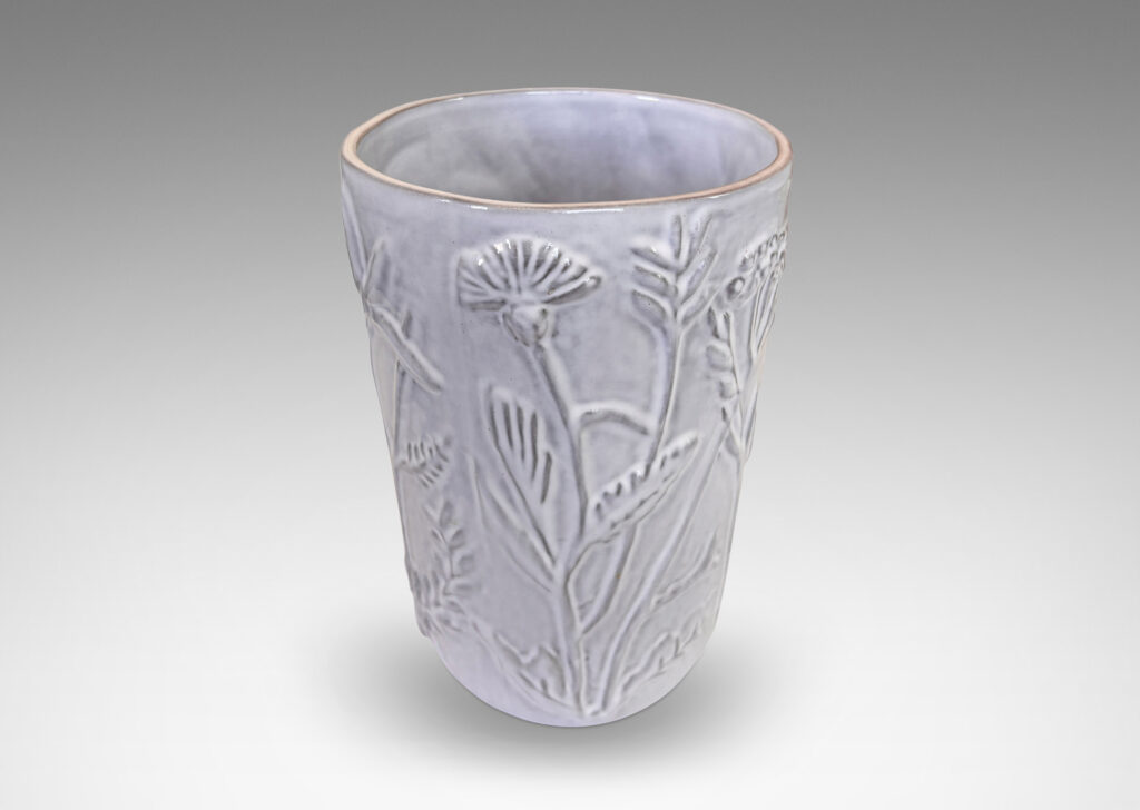 Gallery BAC apered cylindrical form with cast wildflower design in white glaze