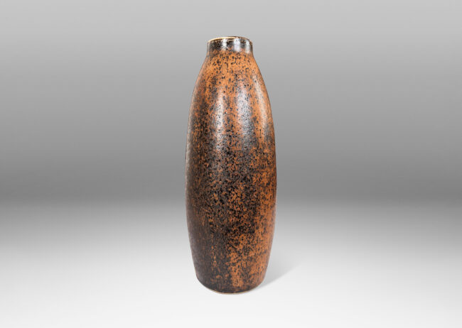 Gallery BAC elongated ovoid form with stippled sgraffito texture in brown and black eggshell finish glazing