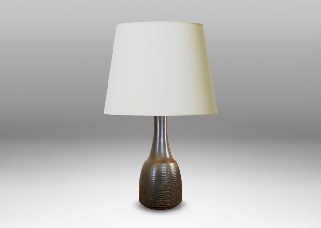 Gallery BAC pawn-like form, with relief linear designs, glazed in an eggshell dark jungle green