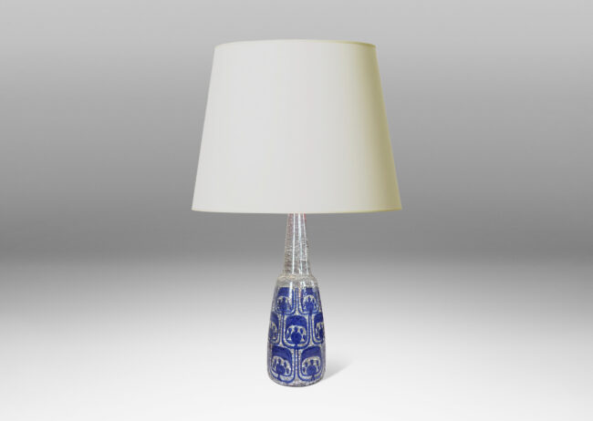 Gallery BAC organically modeled cylindrical form with conical neck, oyster shell craquel luster overglazed with hand-painted blue stylized foliate forms