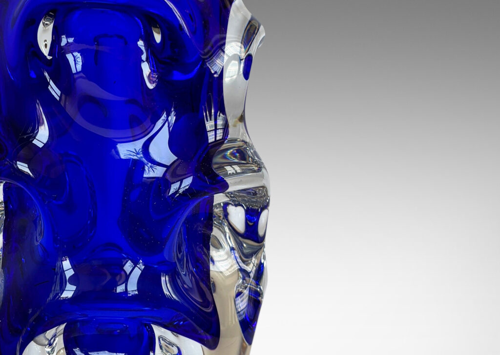 Gallery BAC tall ovoid form with pulled arch motifs in ultramarine under clear glass