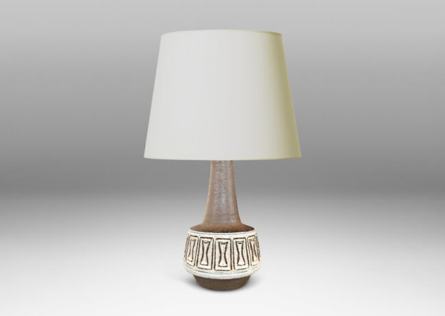 Gallery BAC floating angled drum form with geometric reliefs and conical neck, glazed in eggshell white and matte brown